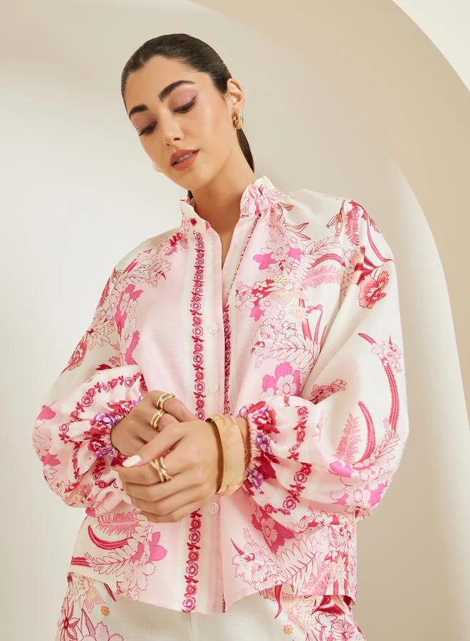 ستايلي بلوزة بطبعة زهور وأكمام منفوخة